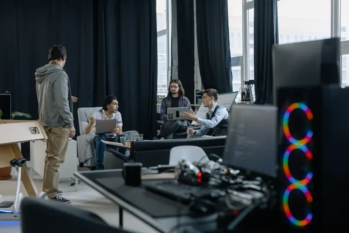 A senior software engineering team collaborating in a Pakistan office — Avaib