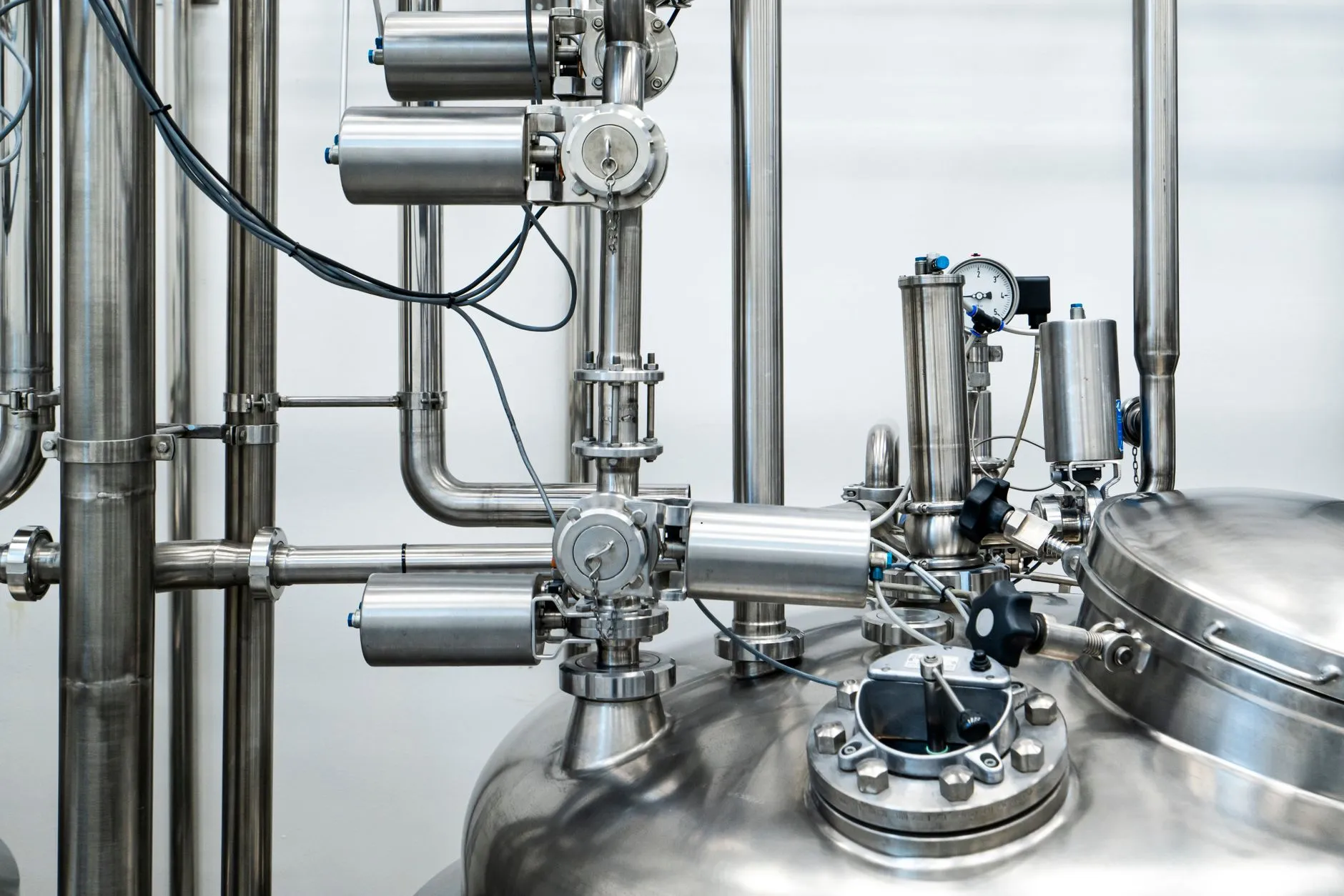 An engineer monitoring AI model performance on a production server dashboard — Avaib