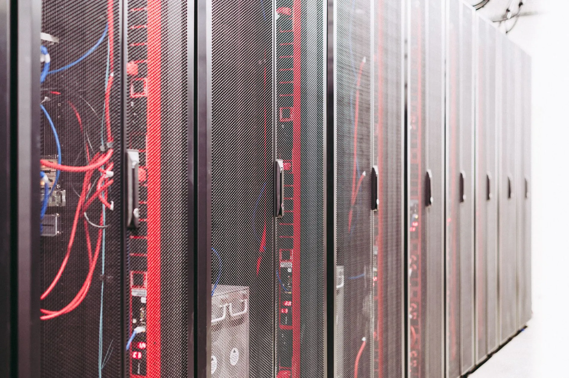 Physical server racks in a data centre being decommissioned for cloud migration — Avaib