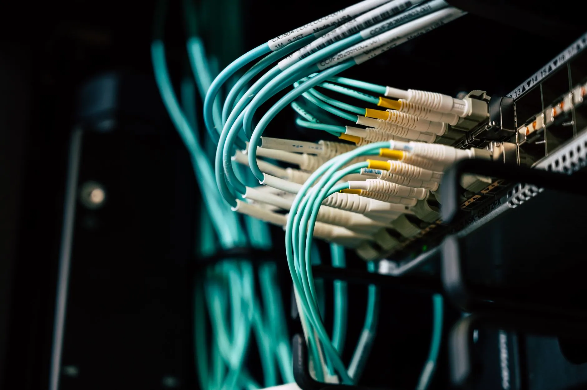 Blue-lit server infrastructure representing a workload moving between cloud providers — Avaib