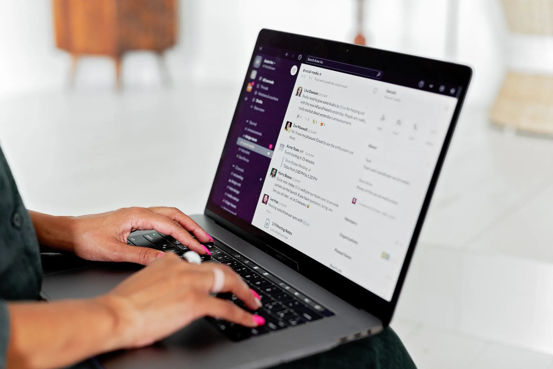A team collaborating and messaging on computers in a modern open-plan office — Avaib