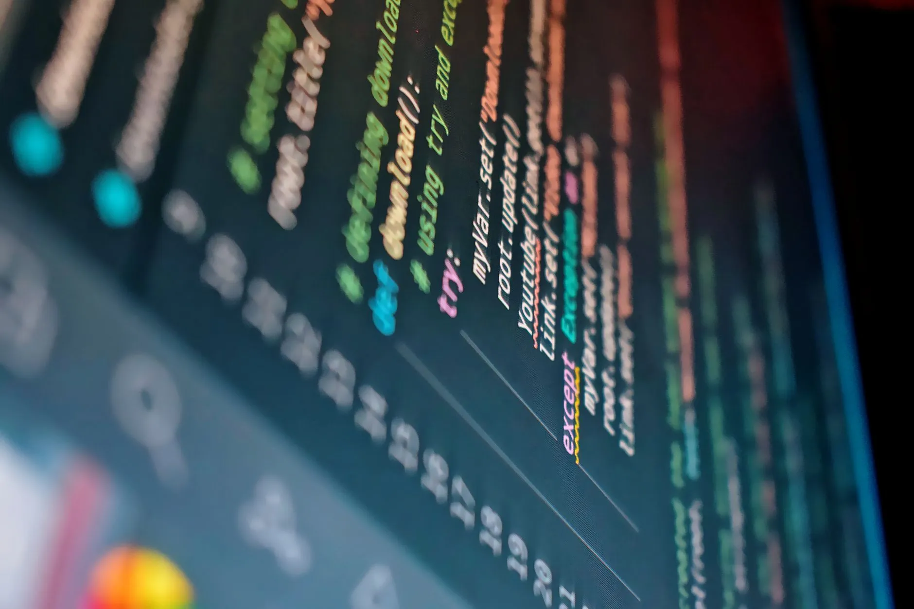 A developer building a customer portal web application on a laptop — Avaib