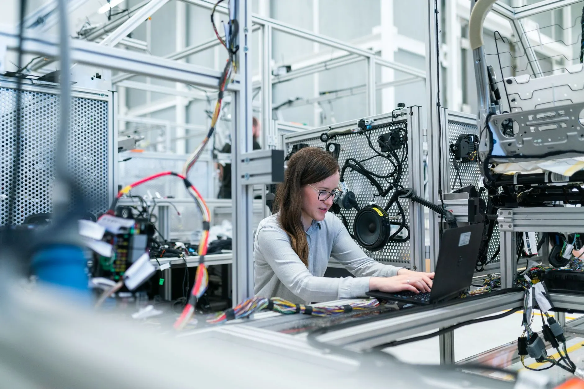 A QA engineer running functional tests on software at a computer — Avaib