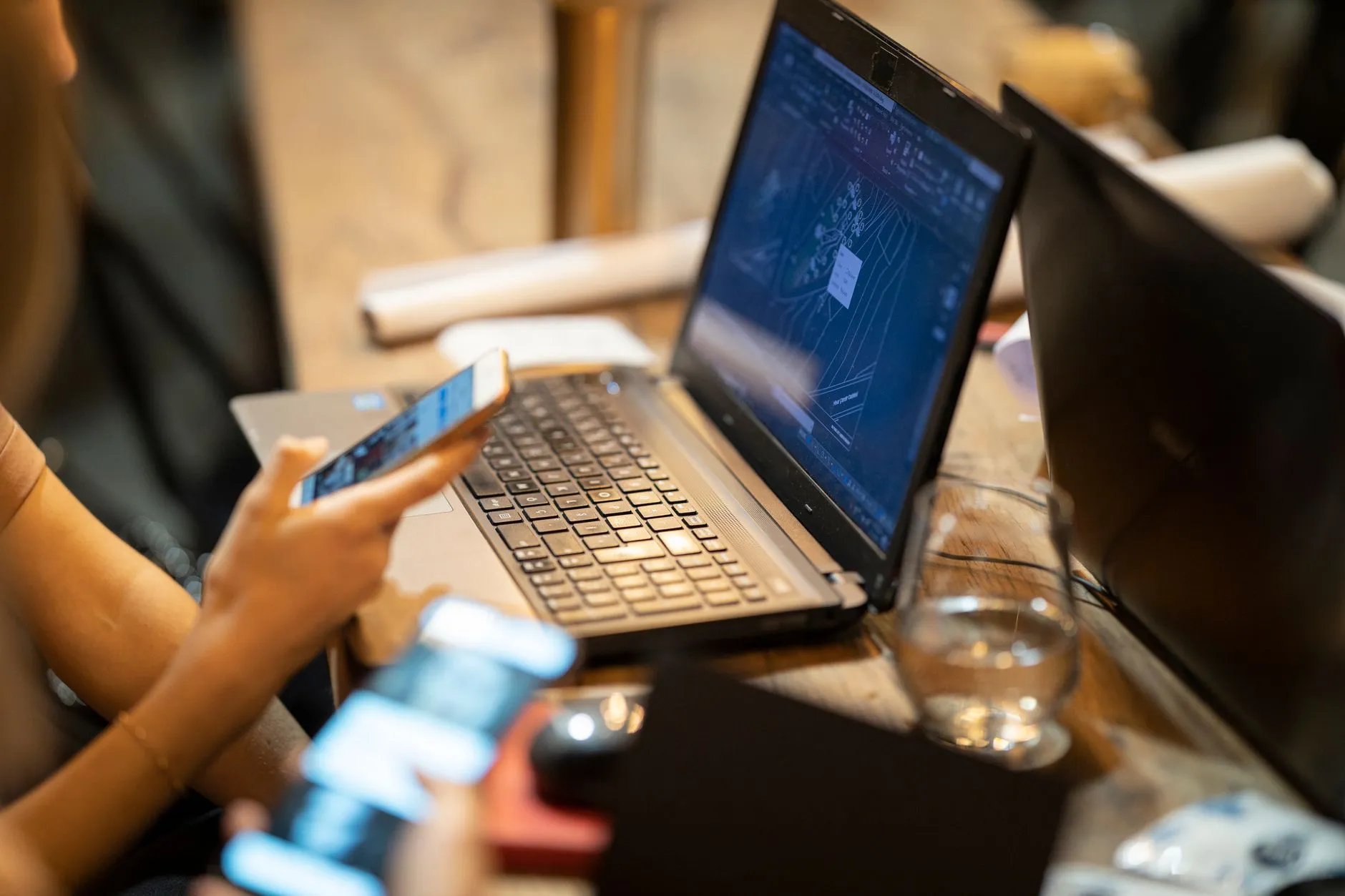 A developer testing software compatibility across multiple devices and screen sizes — Avaib