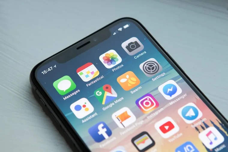 A mobile app running on a smartphone held in hand