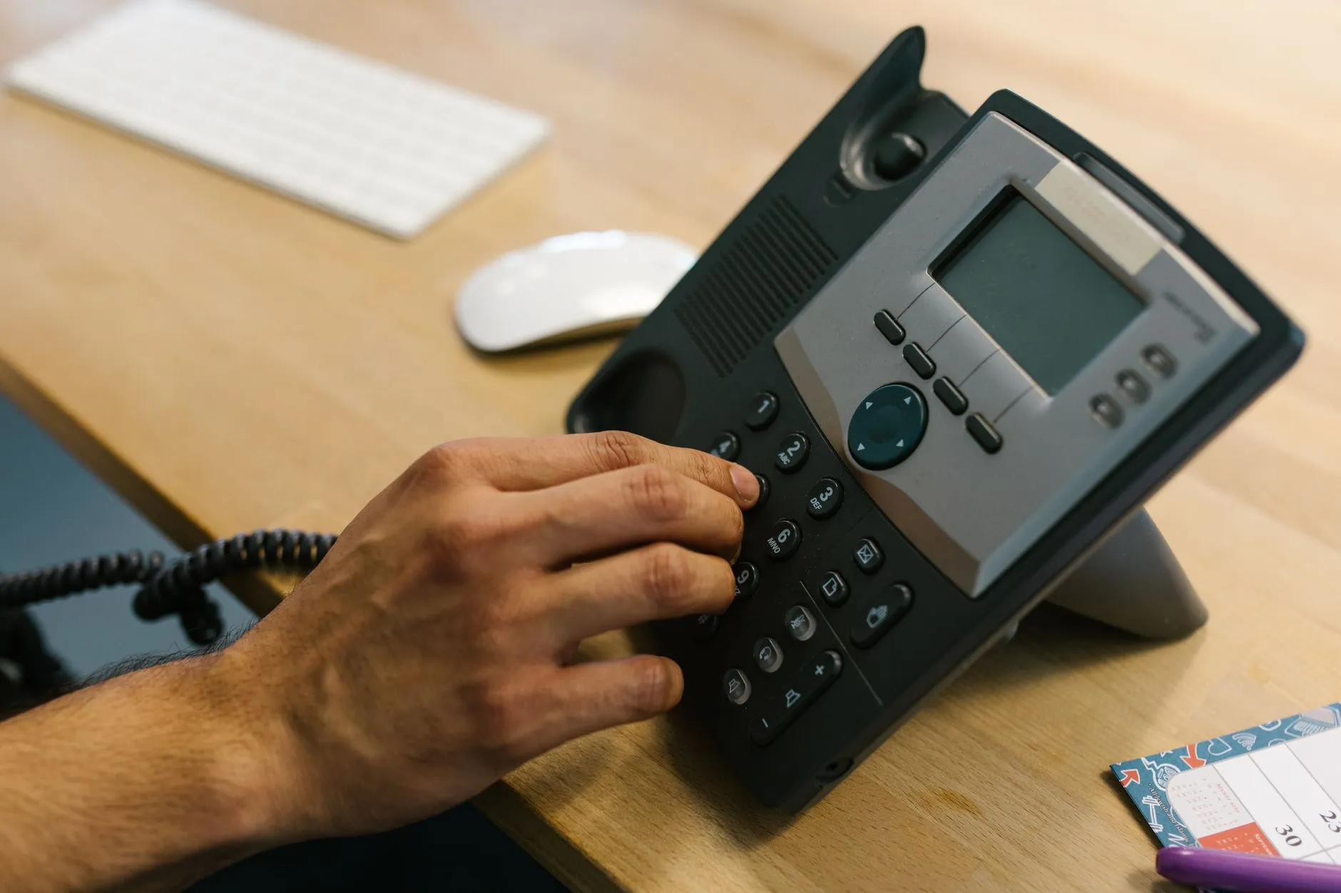 A contact centre agent routing and qualifying calls on a headset — Avaib