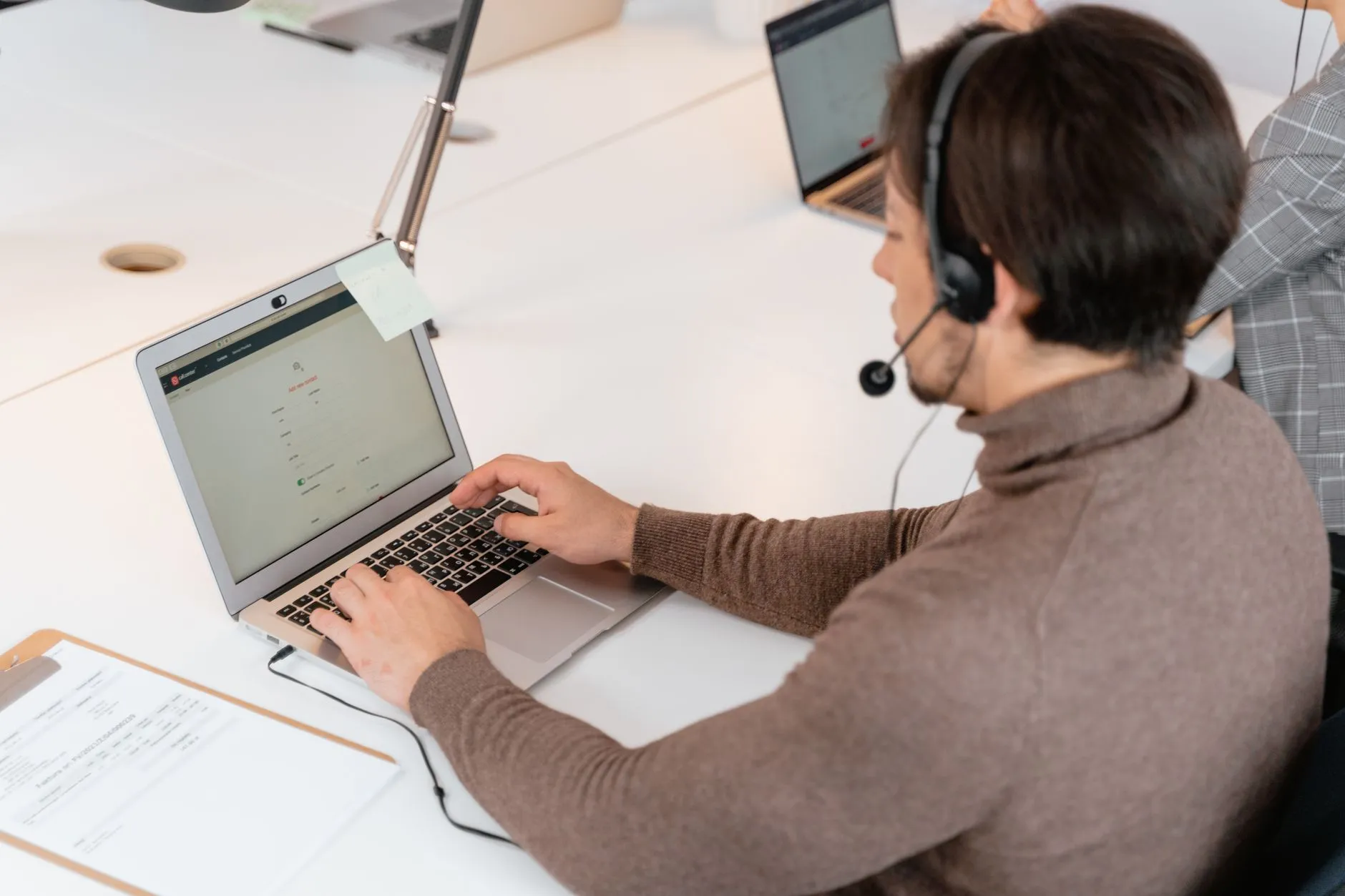A customer using a self-service portal to manage their account online — Avaib